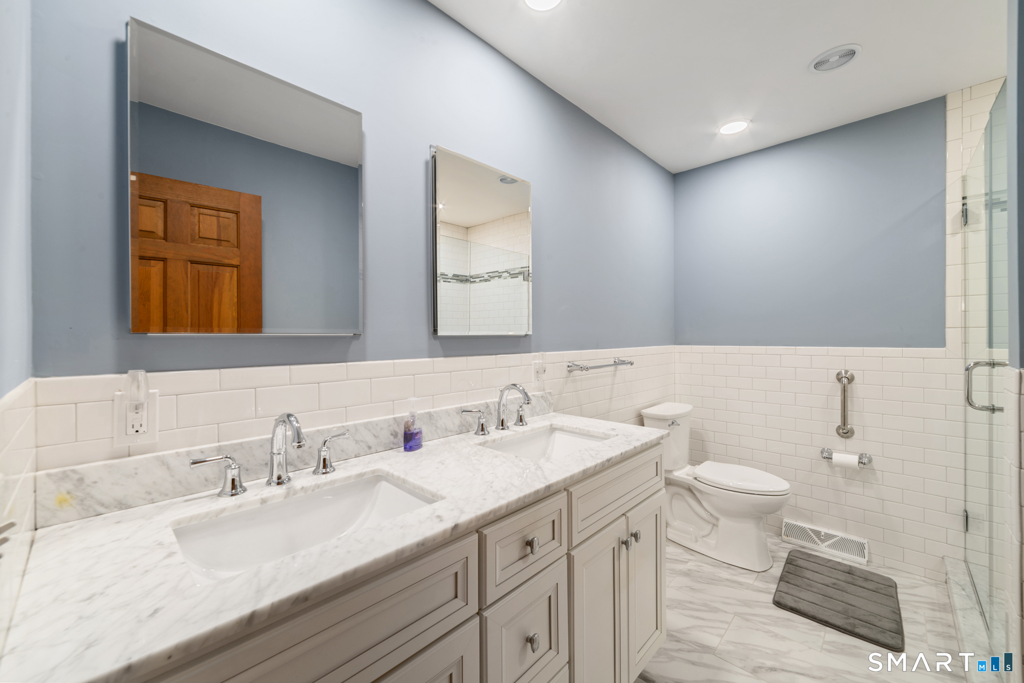 131 Sentinel Hill Road Derby, CT 06418 - Photo 14 of 40 a bathroom with a double vanity sink mirror and toilet
