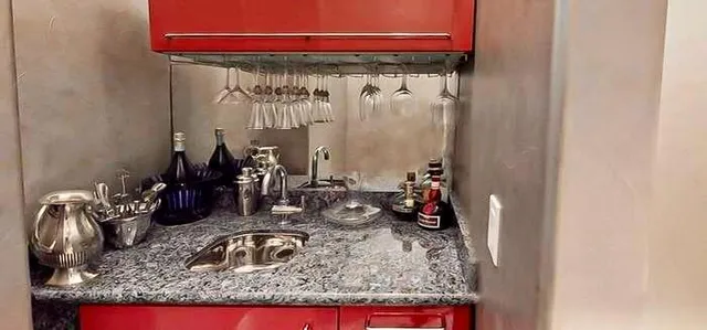 a room with a table and a mirror