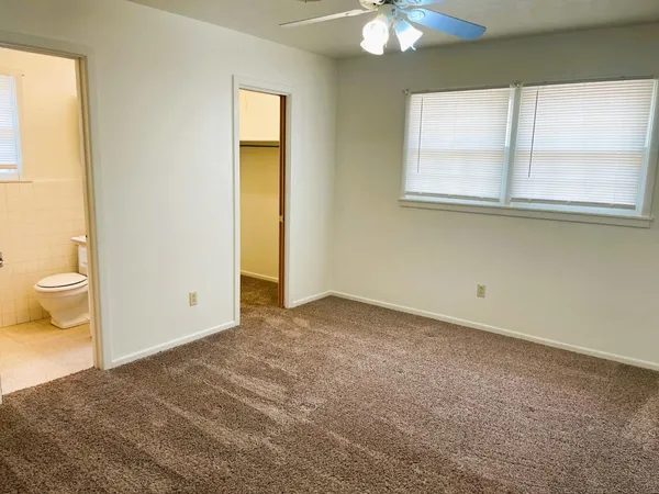 a view of a room that has a window in it
