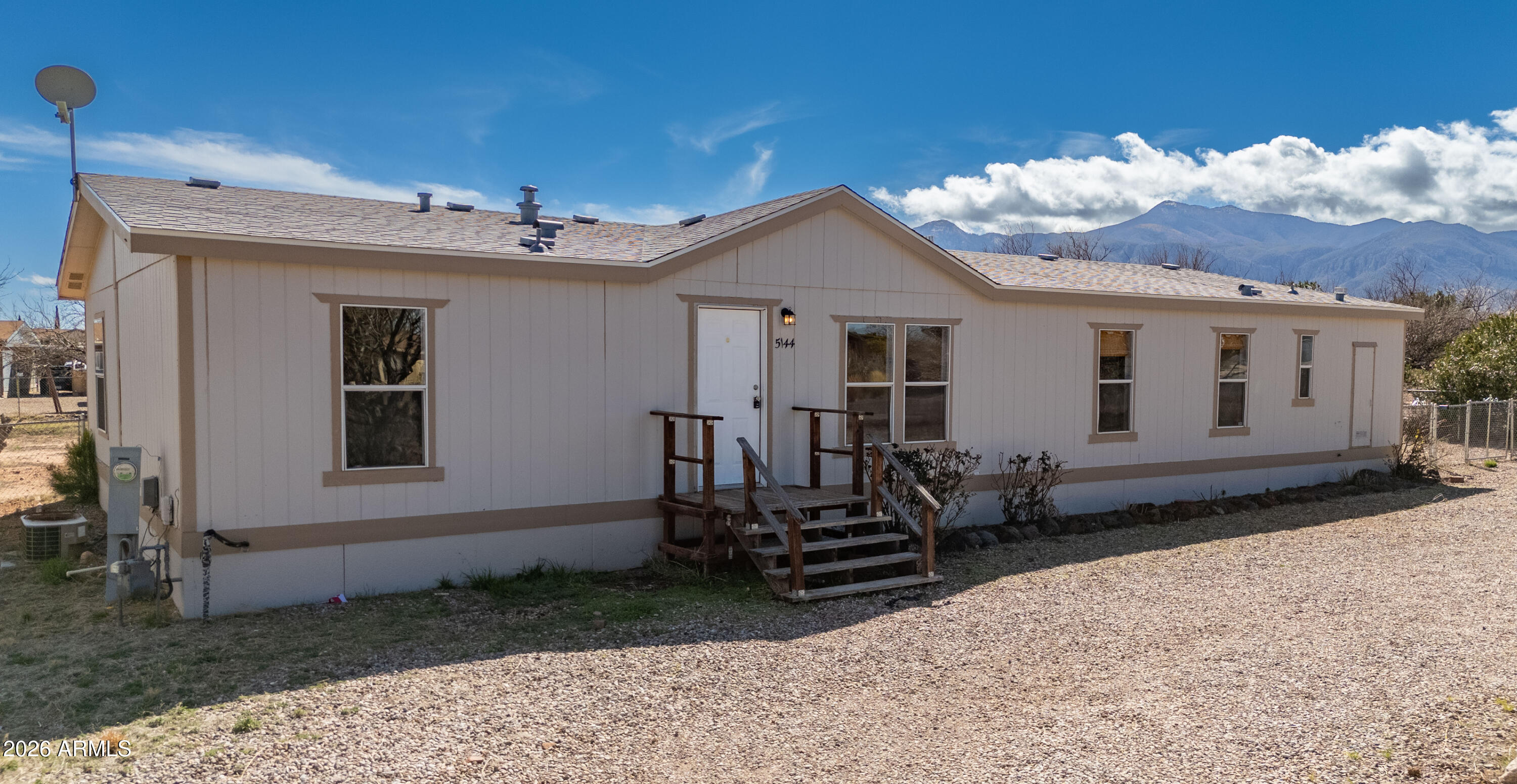 5144 Clearview Road Sierra Vista, AZ 85650 - Photo 2 of 32 a view of a house with backyard and porch