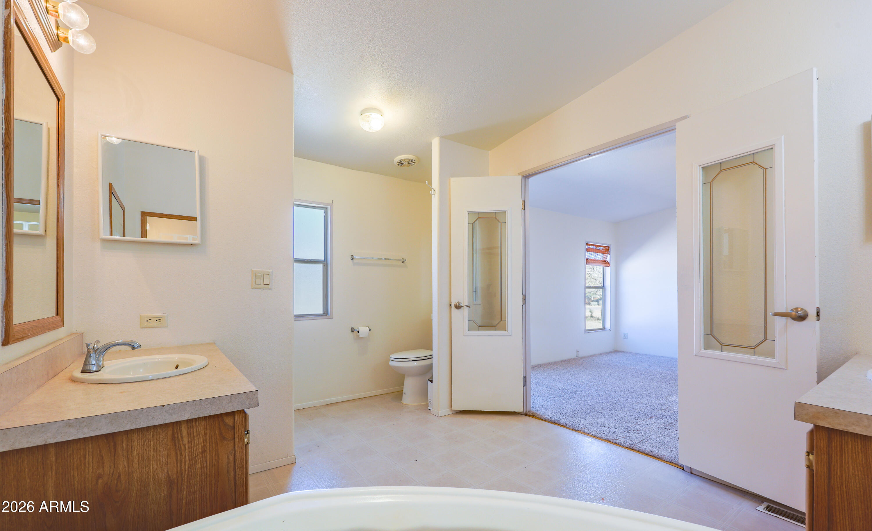 5144 Clearview Road Sierra Vista, AZ 85650 - Photo 21 of 32 a bathroom with a sink a toilet and shower