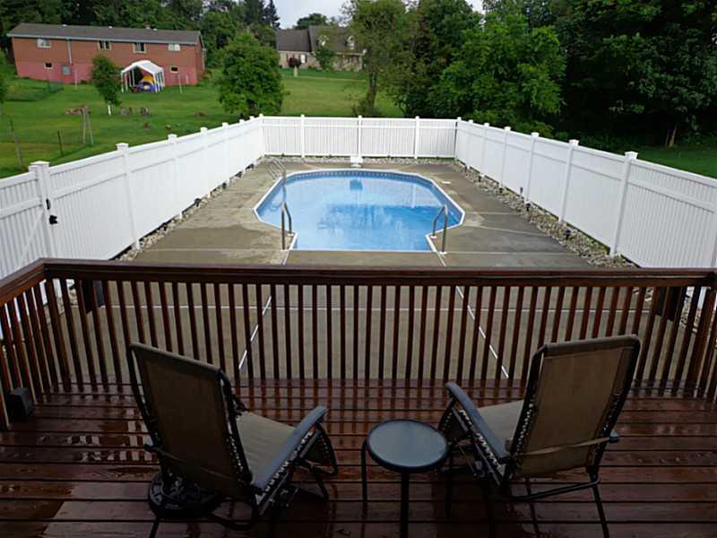 1065 Finchley Road North Huntingdon, PA 15642 - Photo 3 of 25 Swimming Pool/Hot Tub/Sauna. The in-ground swimming pool is fully fenced. It is overlooked by a beautiful deck and several rooms.