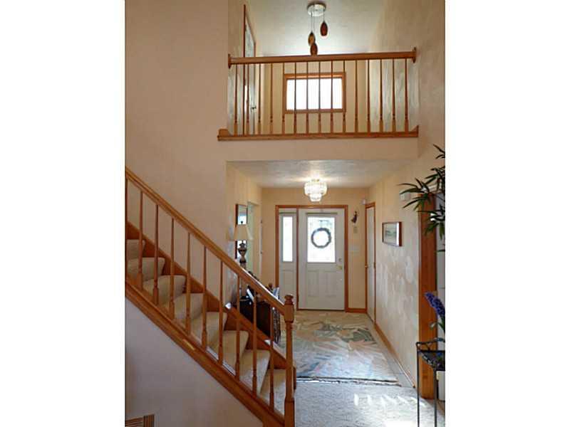 1065 Finchley Road North Huntingdon, PA 15642 - Photo 6 of 25 Den. Looking back toward the front door, you see the den which is in a loft just above it. The den adjoins bedroom two. Off of the foyer are the dining room and coat closet. Make sure and take the virtual tour!