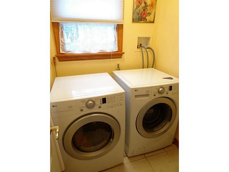 1065 Finchley Road North Huntingdon, PA 15642 - Photo 9 of 25 Kitchen. This laundry room is just off of the kitchen. The kitchen also adjoins the garage which is really convenient. There is a spacious closet just across from this laundry too.