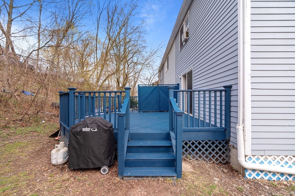 45 Lawn Street Boston, MA 02120 - Photo 20 of 22 a view of a wooden fence with a bench