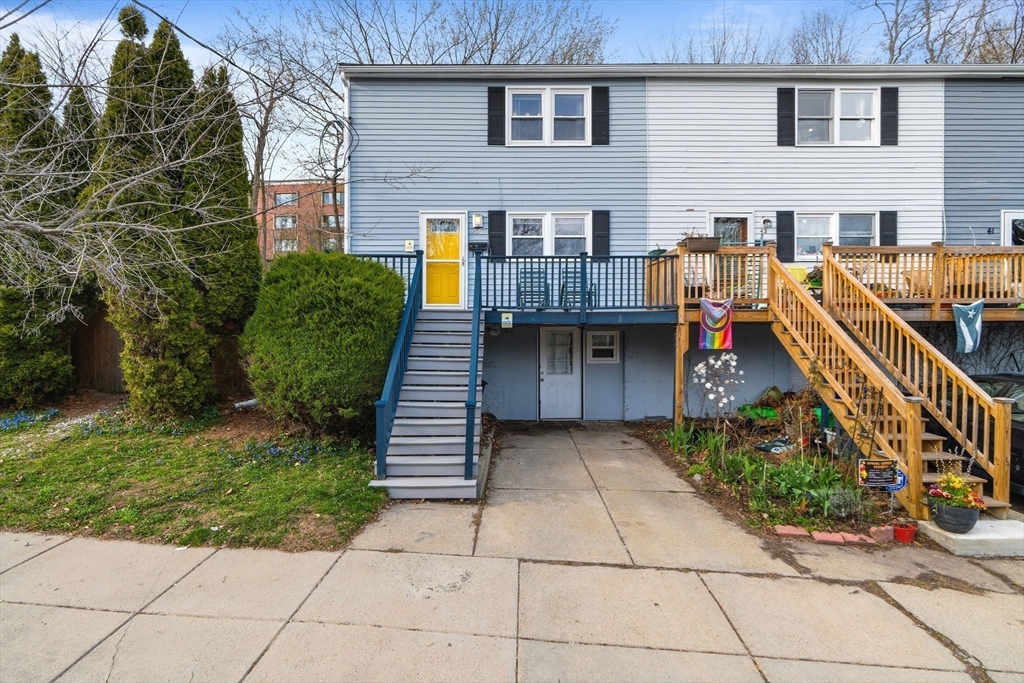 45 Lawn Street Boston, MA 02120 - Photo 22 of 22 a view of a house with backyard and trees