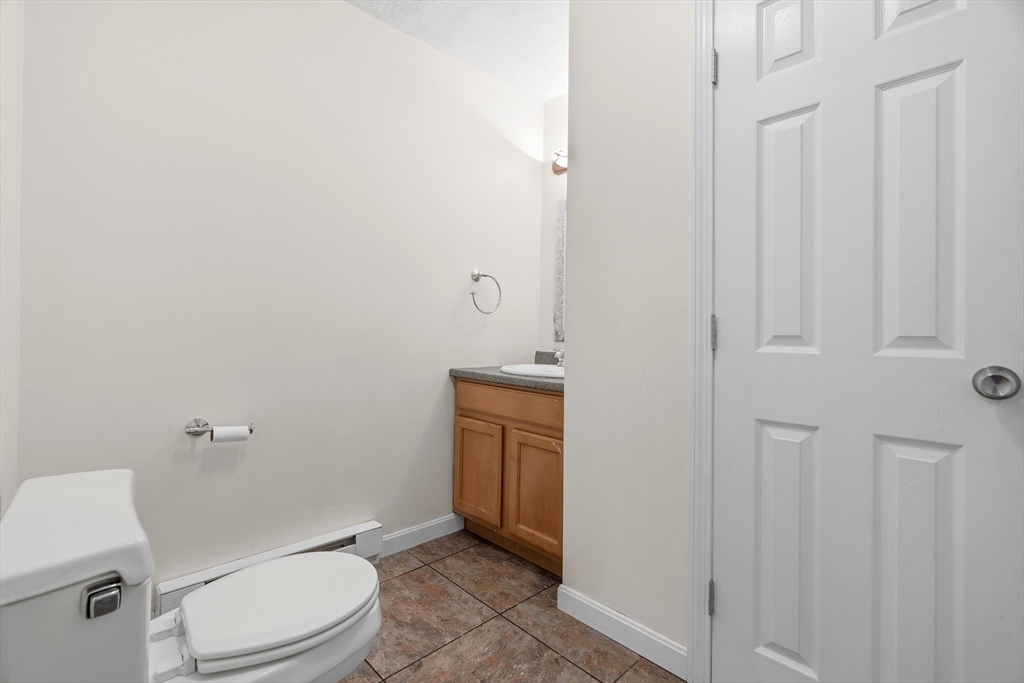 45 Lawn Street Boston, MA 02120 - Photo 7 of 22 a bathroom with a sink a toilet and shower
