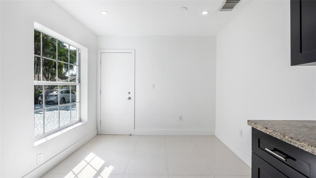 1811 Southwest 124th Way Miramar, FL 33027 - Photo 11 of 29 an empty room with windows
