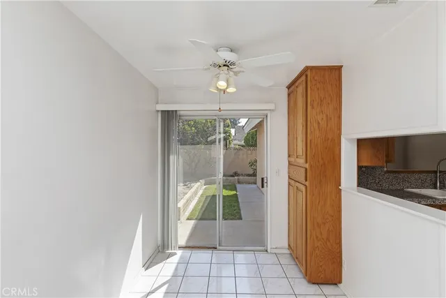 a kitchen with stainless steel appliances a refrigerator and cabinets
