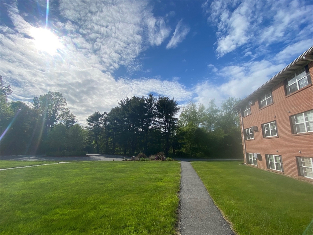 30 Leonard Road, Unit 30 Boxborough, MA 01719 - Photo 23 of 30 a view of yard with green space
