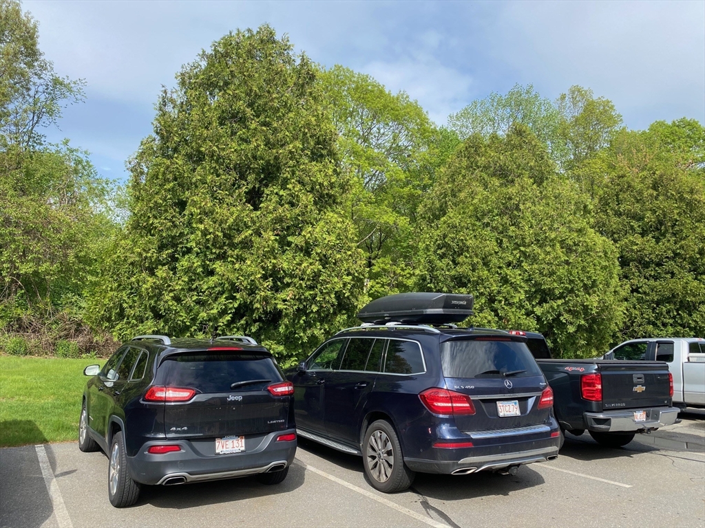 30 Leonard Road, Unit 30 Boxborough, MA 01719 - Photo 28 of 30 a view of car parked in front of a house