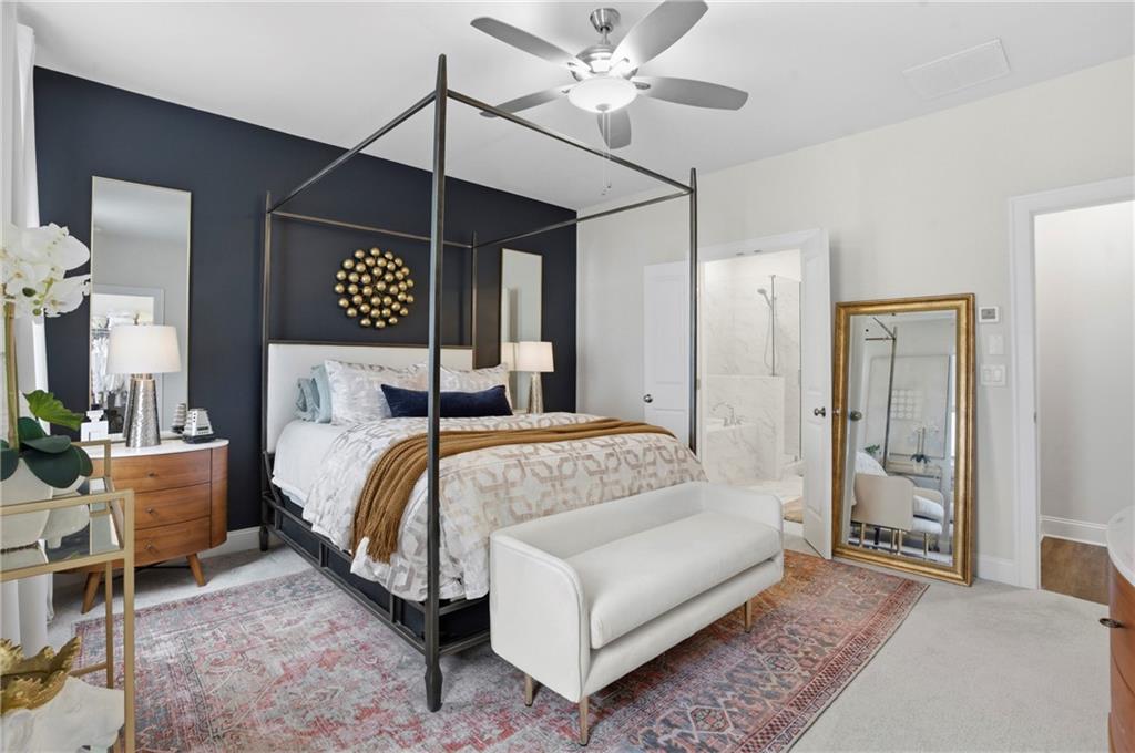 3880 Pr Fld Crossing Suwanee, GA 30024 - Photo 19 of 51 a bedroom with a bed a chandelier and closet