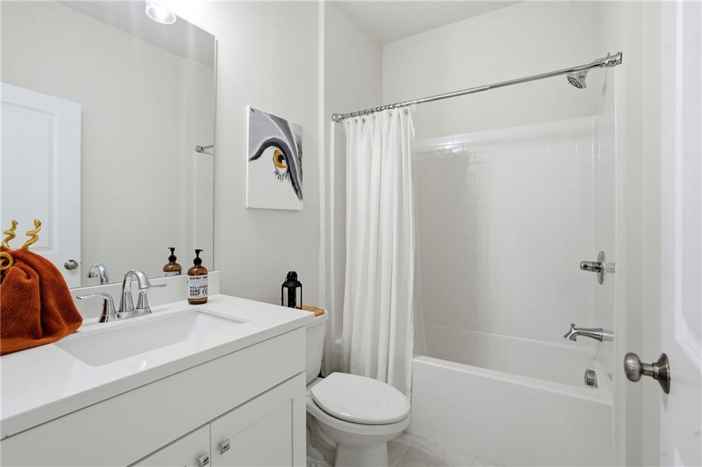 3880 Pr Fld Crossing Suwanee, GA 30024 - Photo 30 of 51 a bathroom with a sink toilet and shower