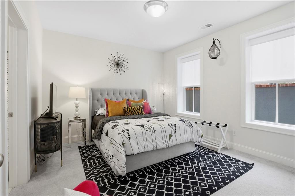 3880 Pr Fld Crossing Suwanee, GA 30024 - Photo 32 of 51 a bedroom with a bed and a window