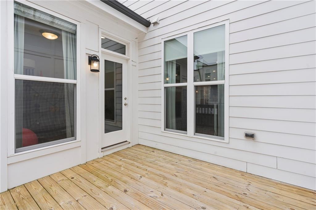 3880 Pr Fld Crossing Suwanee, GA 30024 - Photo 38 of 51 a view of front door of house