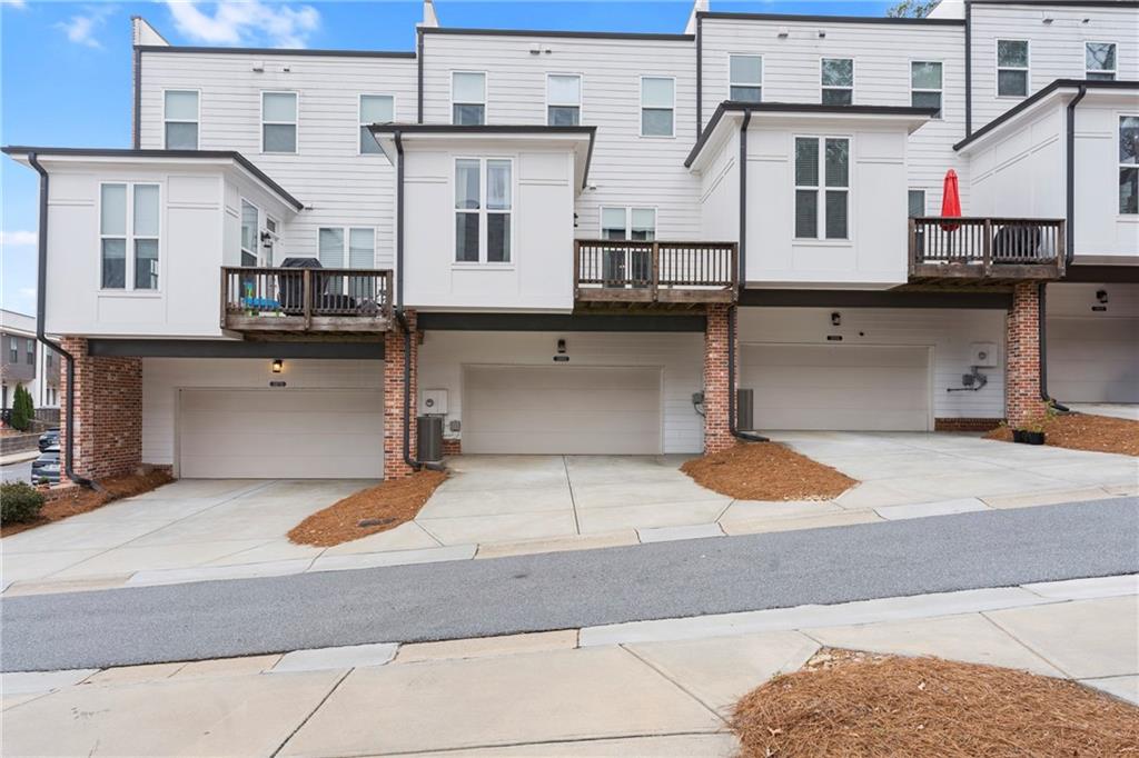 3880 Pr Fld Crossing Suwanee, GA 30024 - Photo 41 of 51 a view of a street with house