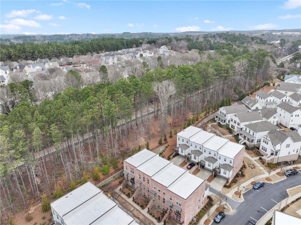 3880 Pr Fld Crossing Suwanee, GA 30024 - Photo 43 of 51 a view of a house with a yard
