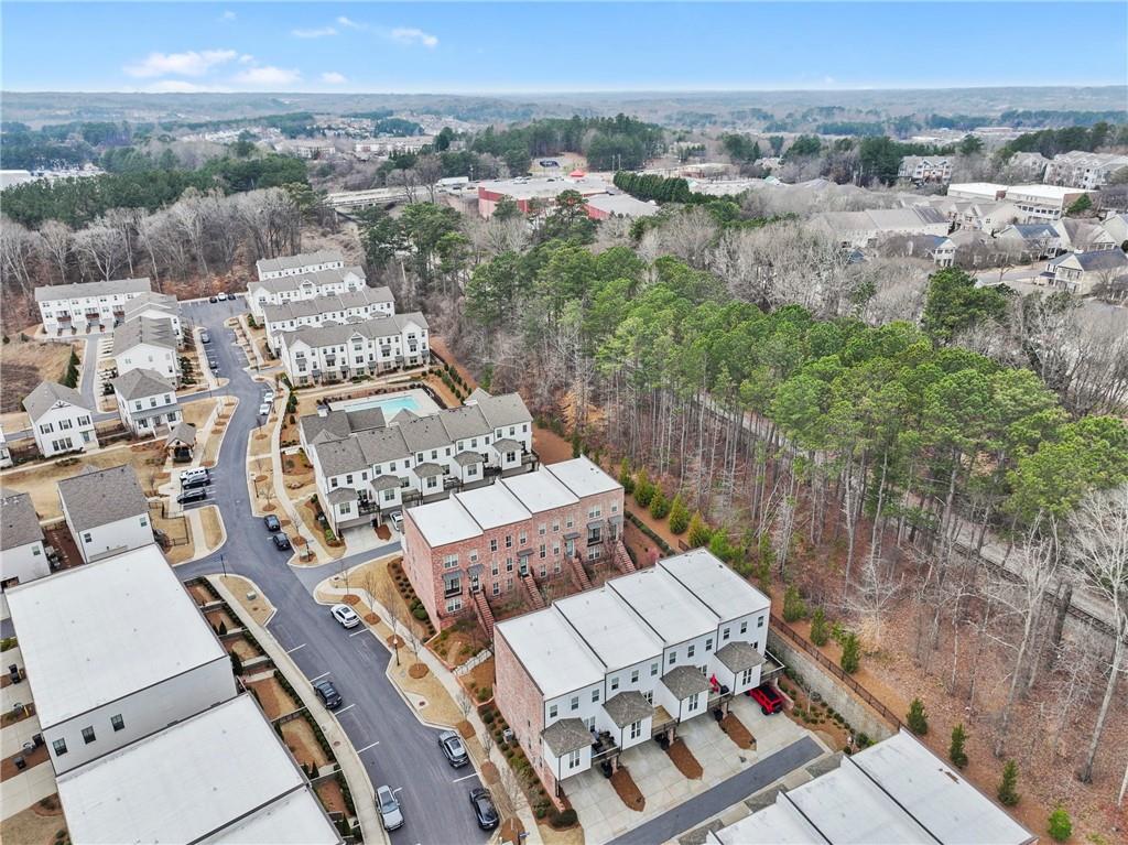 3880 Pr Fld Crossing Suwanee, GA 30024 - Photo 46 of 51 an aerial view of a house with a yard