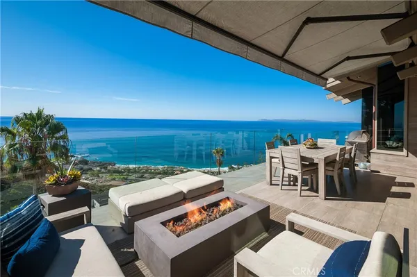 a view of a terrace with furniture and outdoor view