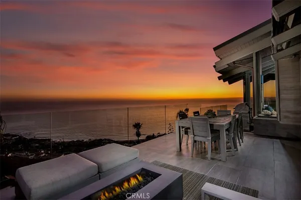 a view of a terrace with seating area
