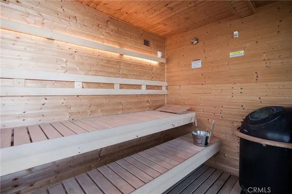 a view of a balcony with wooden floor and outdoor space