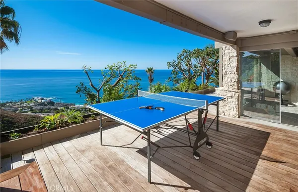 a view of a balcony with chairs