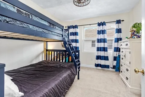 a bedroom with a bed and a walk in closet