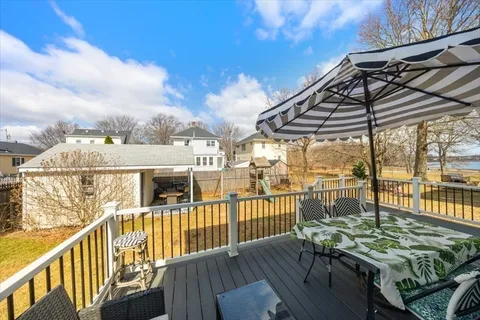 a view of a balcony with chairs