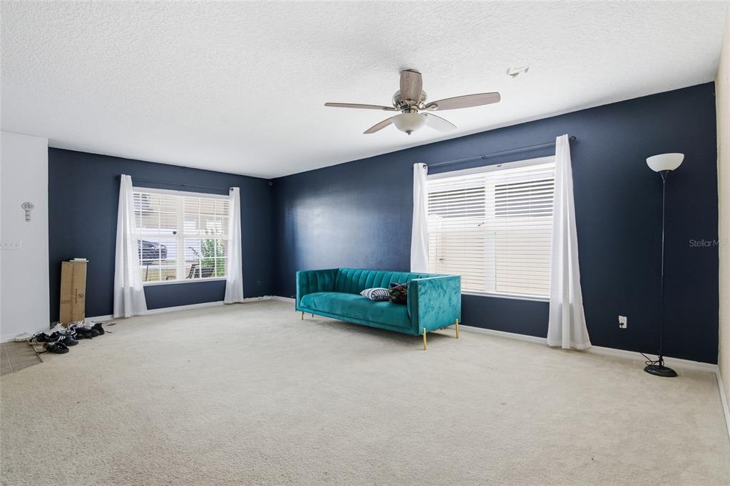 2463 Martins Run Tavares, FL 32778 - Photo 15 of 24 a living room with furniture and a window