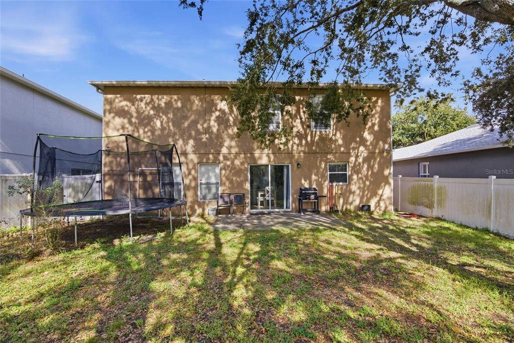 2463 Martins Run Tavares, FL 32778 - Photo 20 of 24 a view of a house with a yard and sitting area