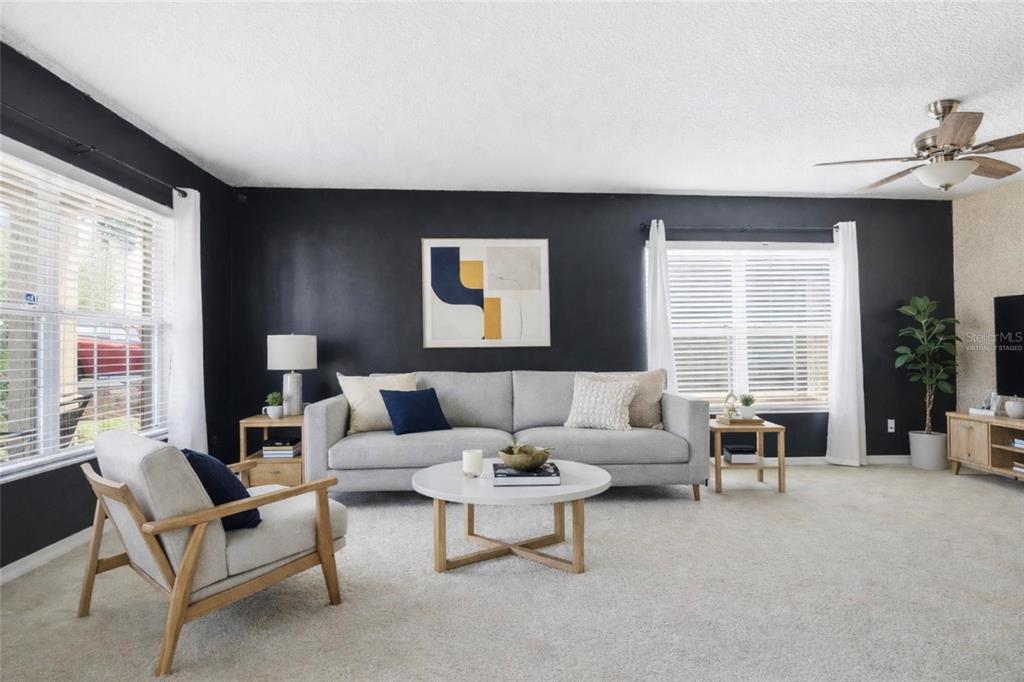 2463 Martins Run Tavares, FL 32778 - Photo 2 of 24 a living room with furniture and a large window