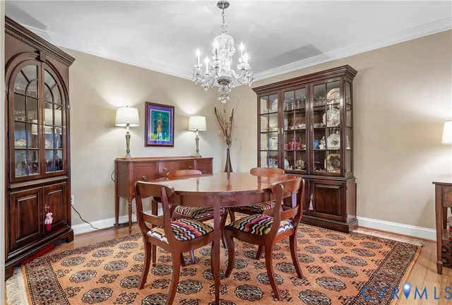 a living room with furniture fireplace and window