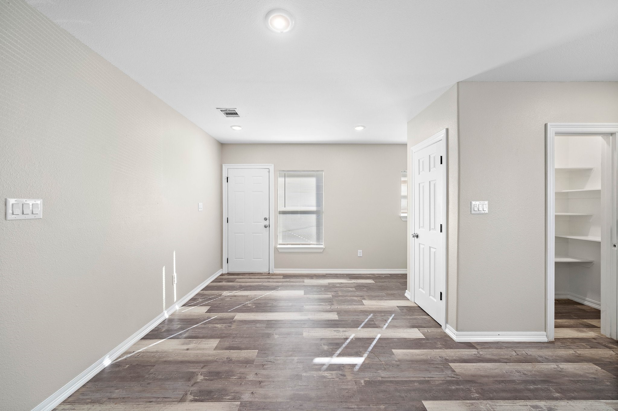 9118 Sandra Street, Unit B Houston, TX 77016 - Photo 3 of 10 a view of an empty room