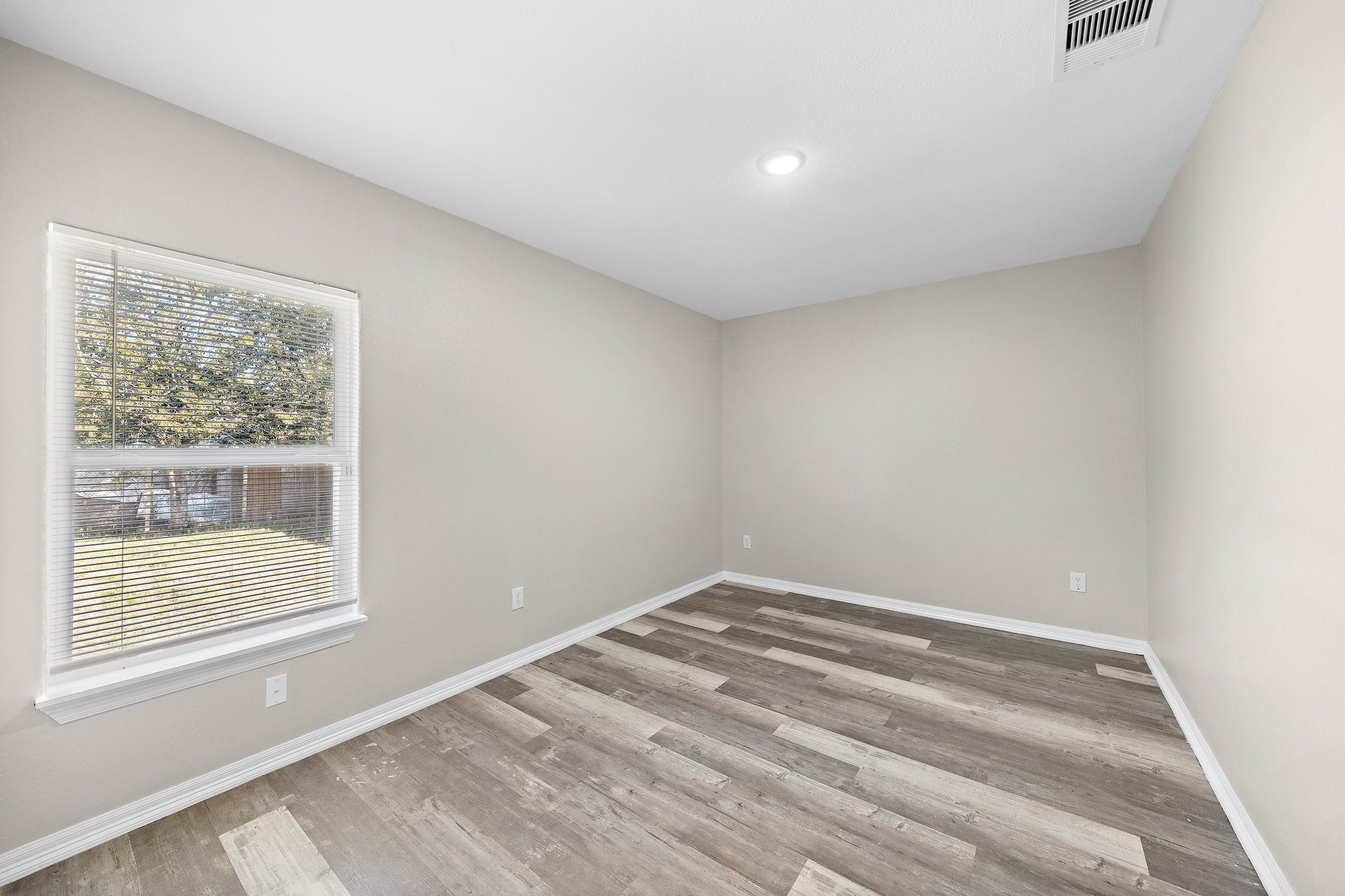 9118 Sandra Street, Unit B Houston, TX 77016 - Photo 4 of 10 a view of room with window