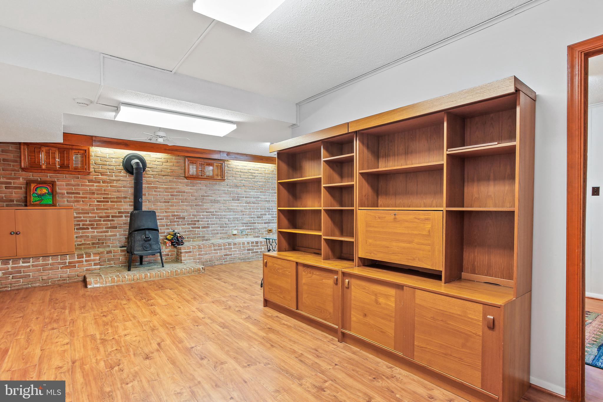 8216 Scotts Level Road Pikesville, MD 21208 - Photo 31 of 42 Large Lower Level Rec Room