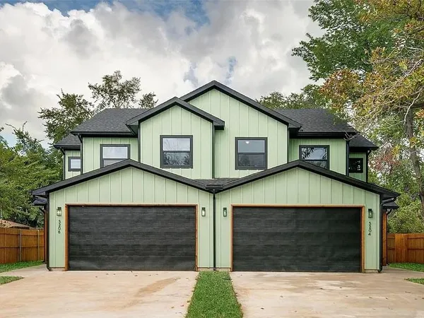 a view of front of house with garage