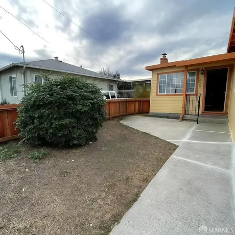 a view of house with outdoor space