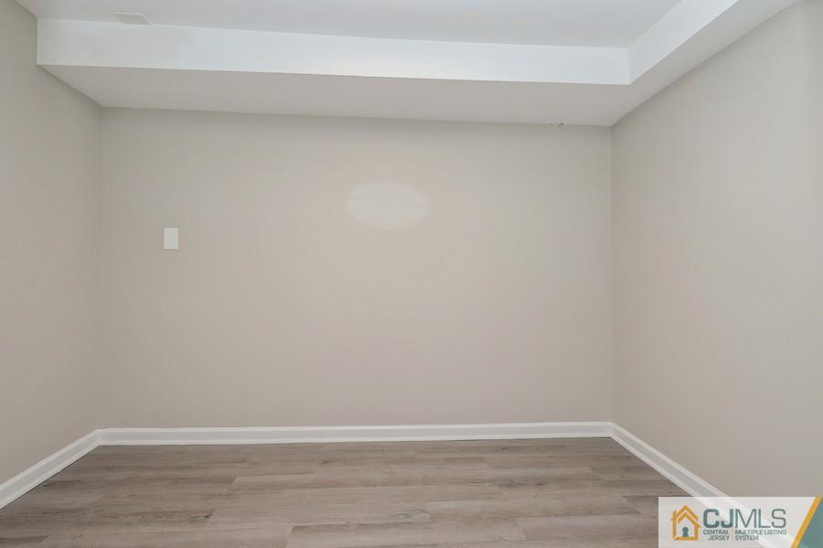 139 Tennent Road Morganville, NJ 07751 - Photo 14 of 15 a view of an empty room