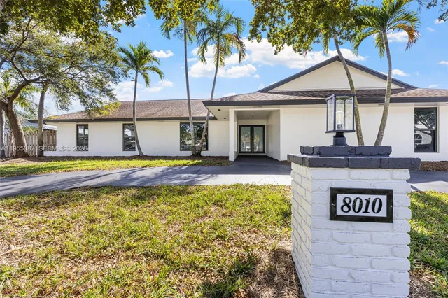 a view of a hallway to a house