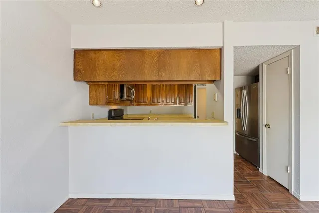 a kitchen with a stove and a microwave
