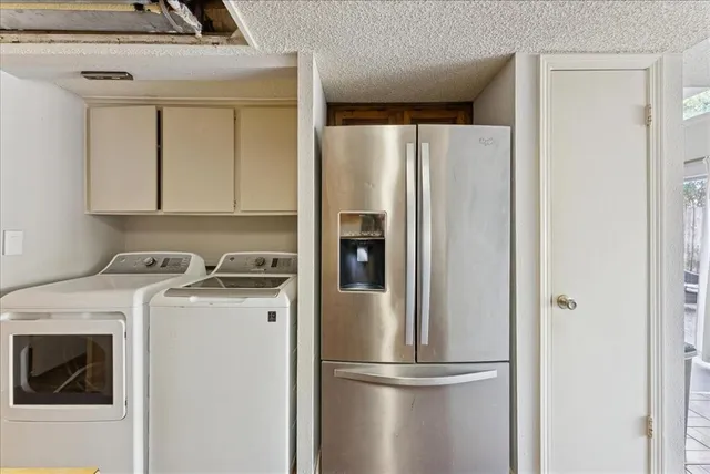 a bathroom with a sink vanity granite toilet and a mirror