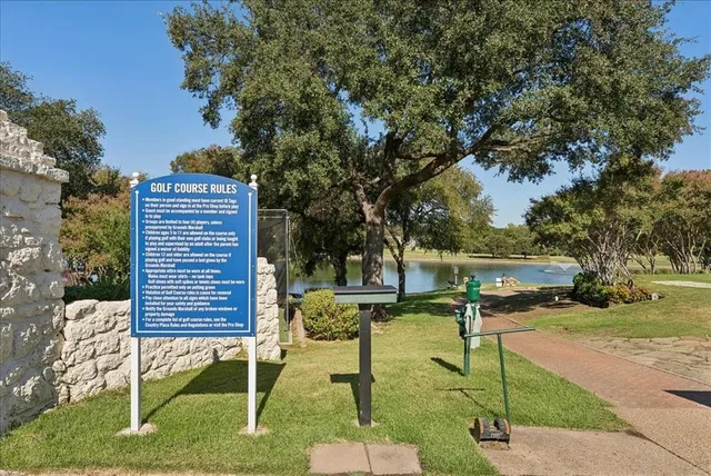 a view of a lake with a park