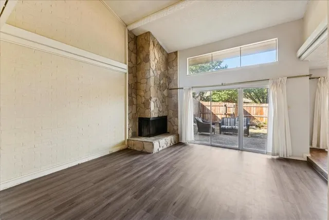 a view of livingroom with furniture wooden floor and window