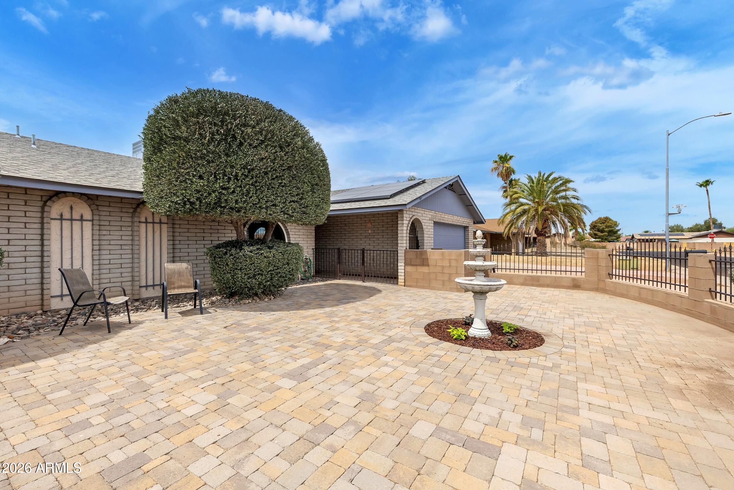 3833 West Phelps Road Phoenix, AZ 85053 - Photo 9 of 55 Paver front courtyard entry