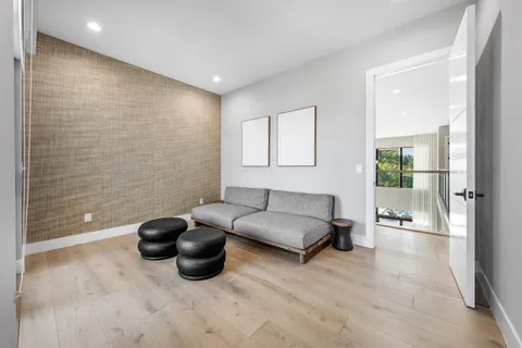 an aerial view of a house with a yard and garden