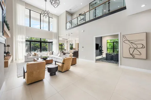 a kitchen with stainless steel appliances kitchen island granite countertop a sink and cabinets