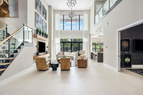 a kitchen with stainless steel appliances kitchen island granite countertop a sink and cabinets