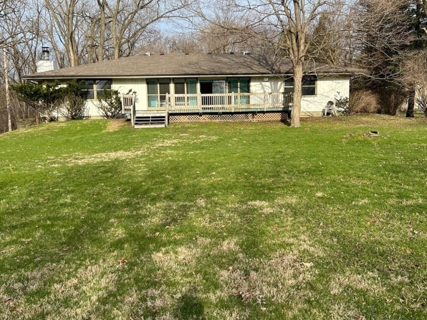 26180 North Willow Road Barrington, IL 60010 - Photo 2 of 11 a big house with a big yard and large trees