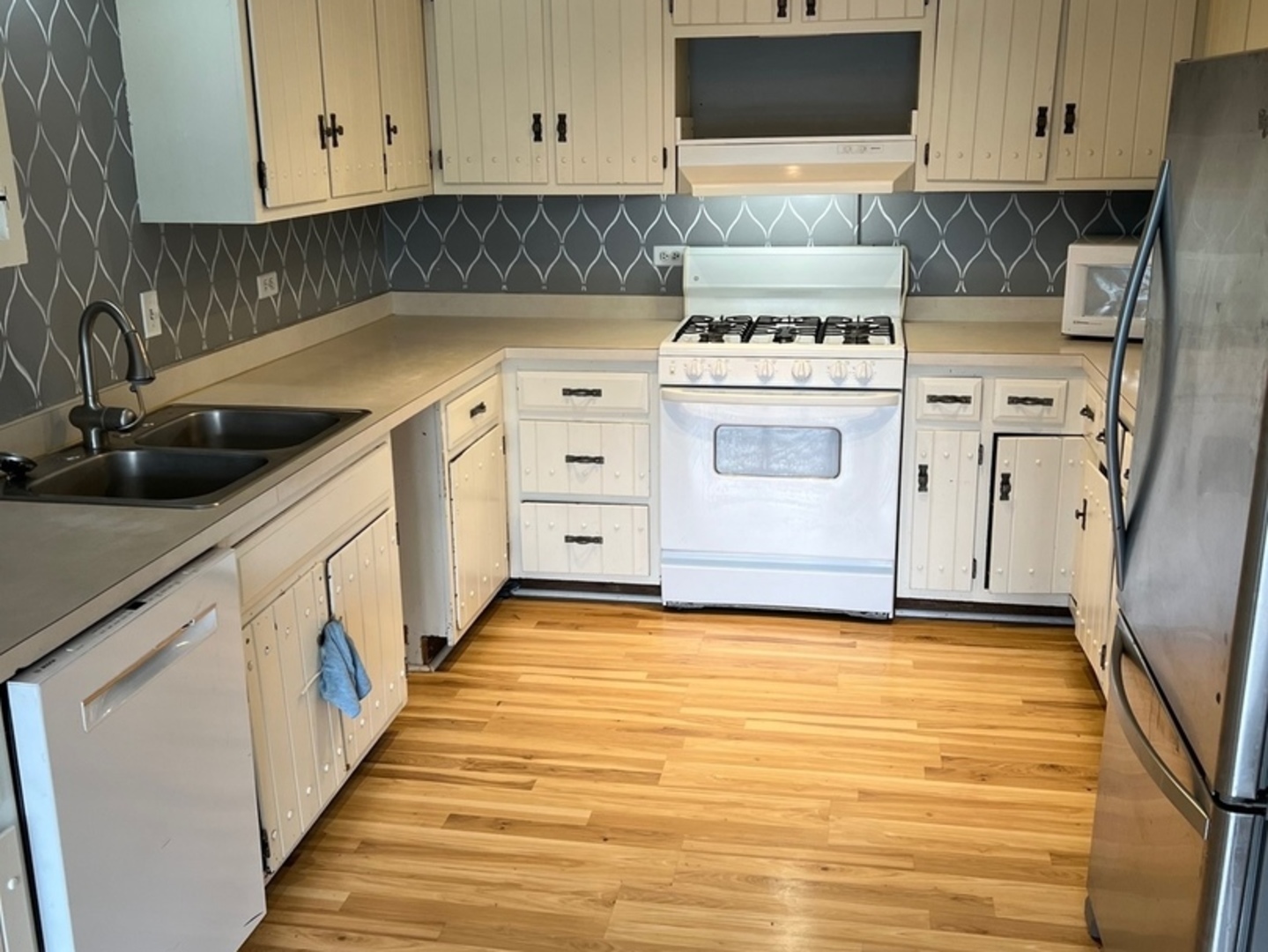 26180 North Willow Road Barrington, IL 60010 - Photo 6 of 11 a kitchen with cabinets appliances and a sink
