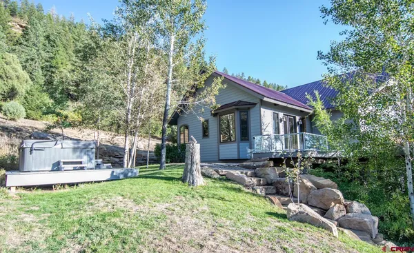 a view of an outdoor sitting area with fire pit